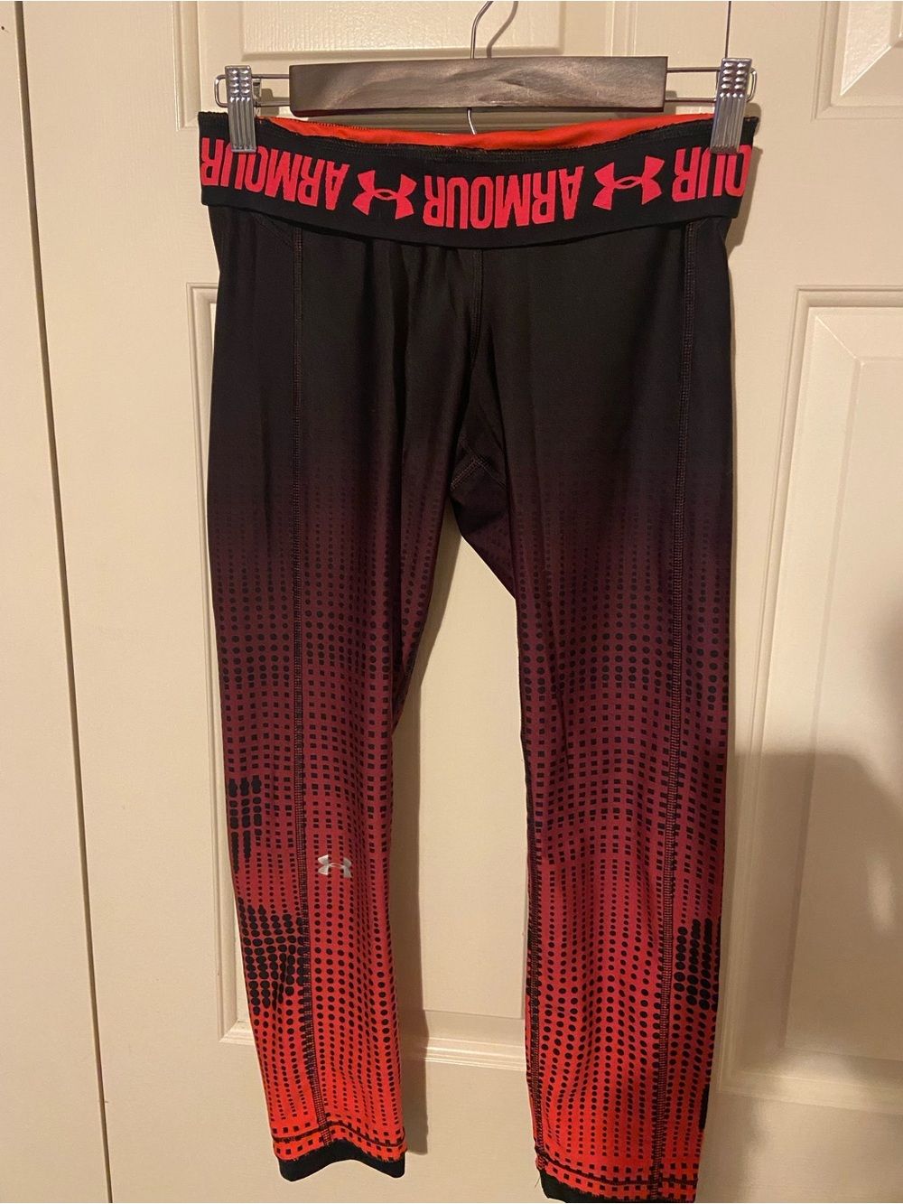 Under Armour ladies hot pinkish/red and Black leggings